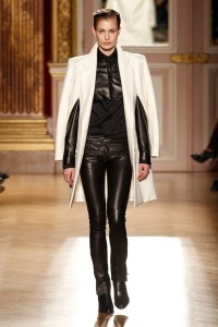 black leather pants with black leather top and white cape jacket. Gorgeous! mixed media top and black and white trend